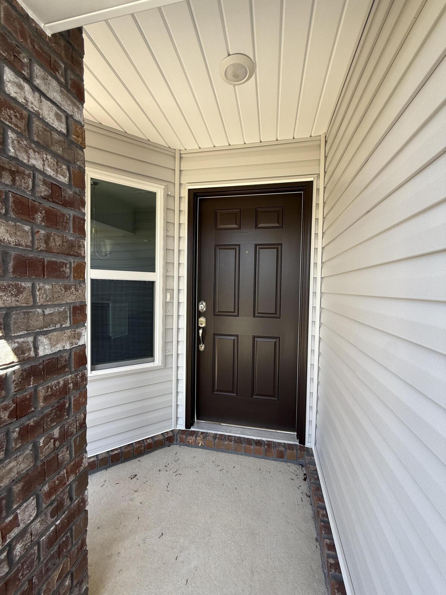 6014 Crocket Cove Crestview, FL 32539 - Photo 6 of 29 a view of an entrance of the house