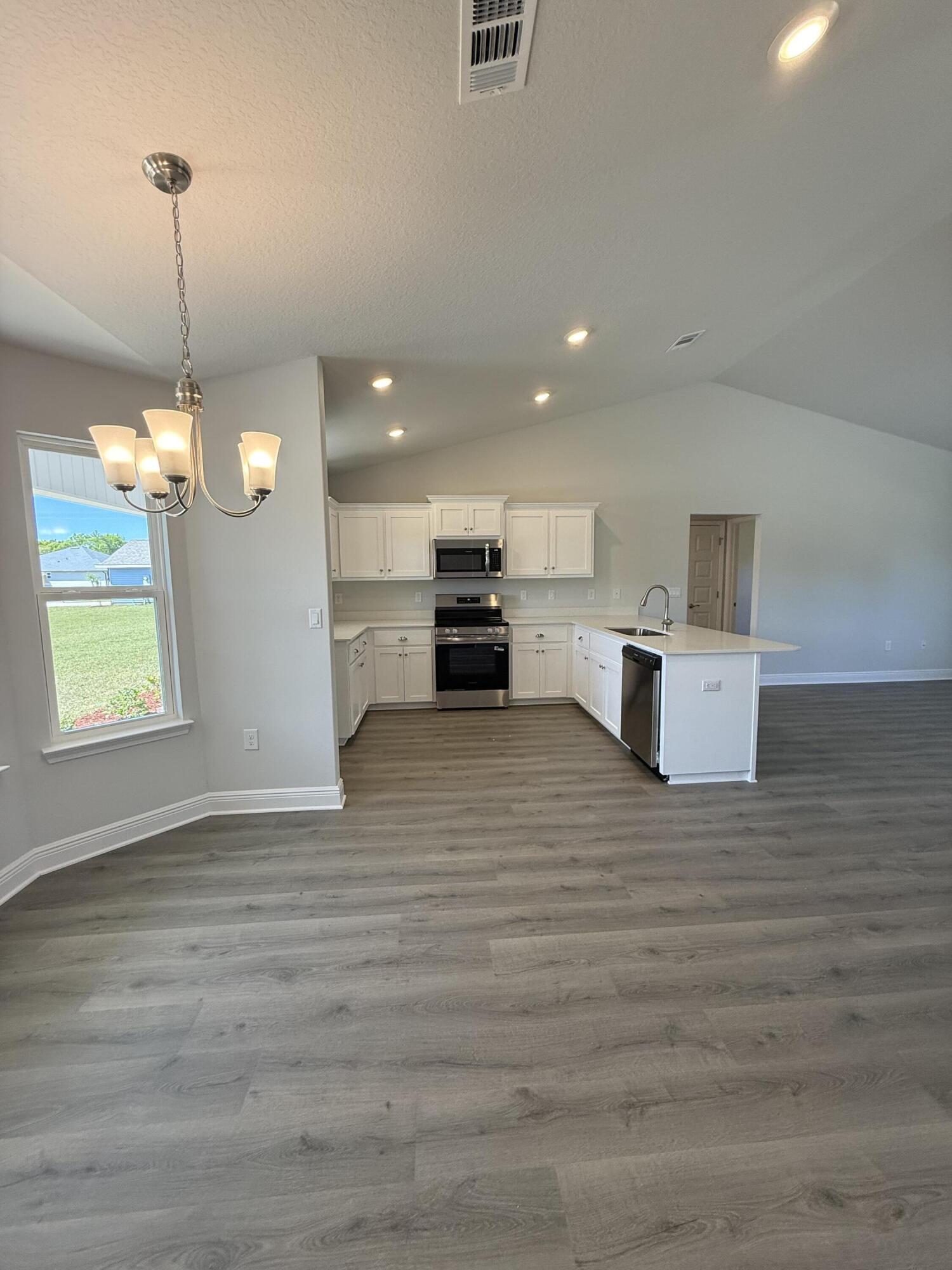6014 Crocket Cove Crestview, FL 32539 - Photo 7 of 29 a view of kitchen and window
