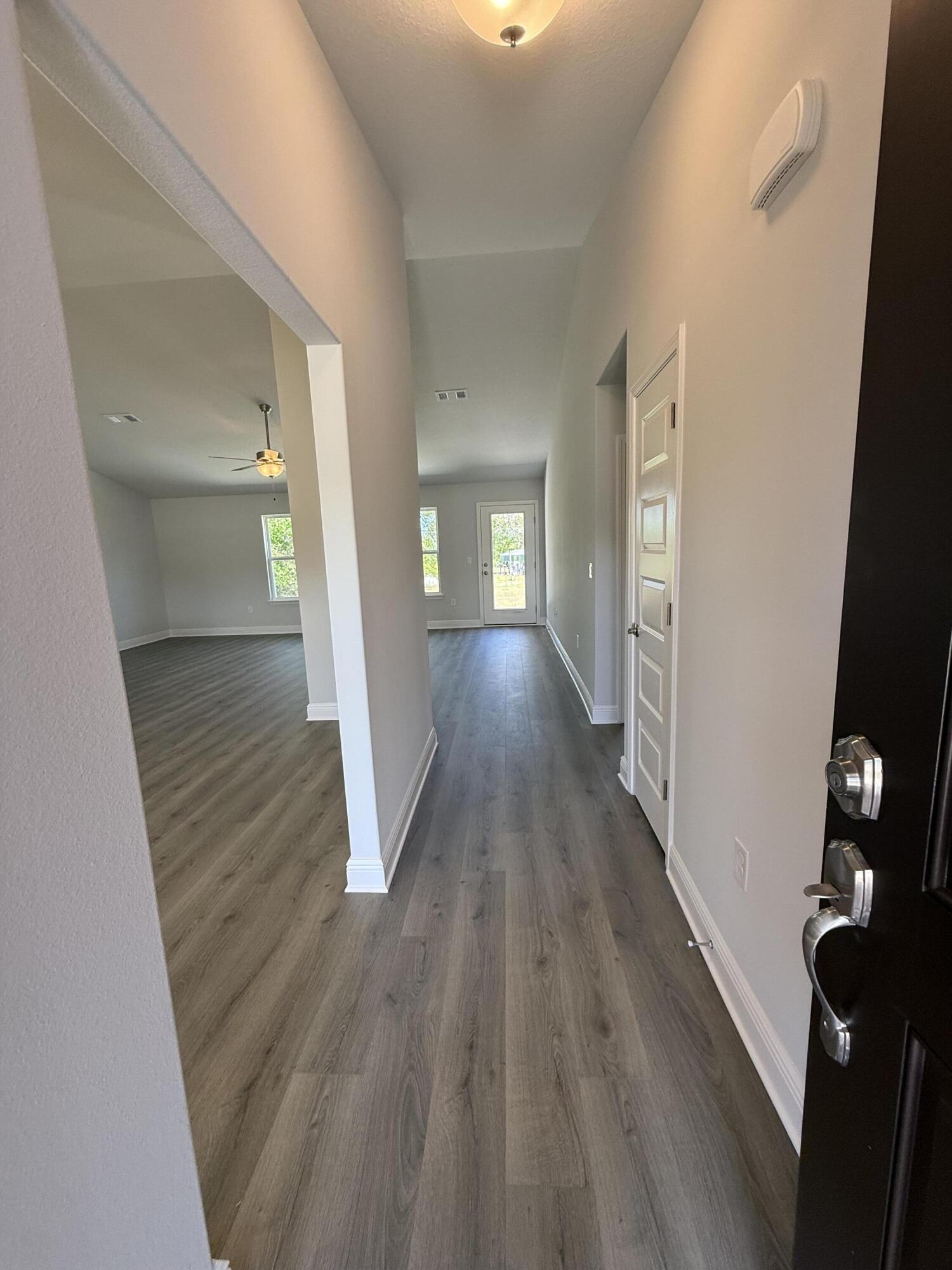 6014 Crocket Cove Crestview, FL 32539 - Photo 10 of 29 wooden floor in a gallery