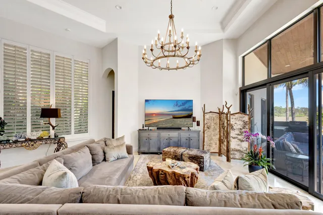a bathroom with a shower and a glass door