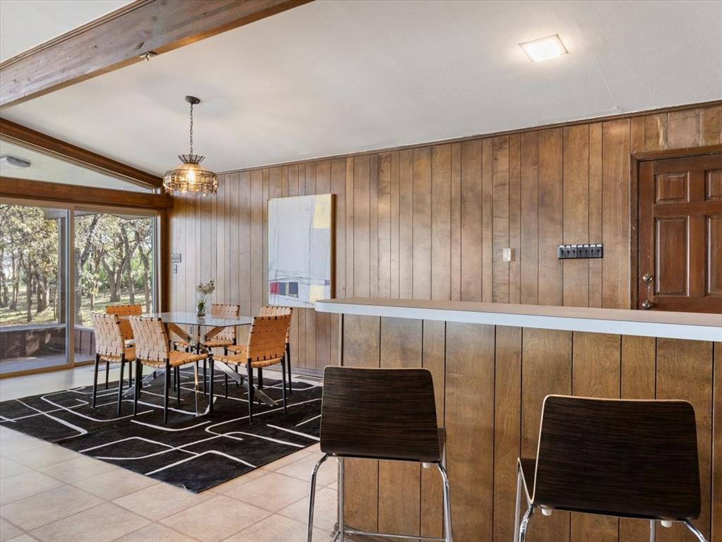 13030 Miller Road Azle, TX 76020 - Photo 17 of 40 a view of a dining room with furniture window and outside view