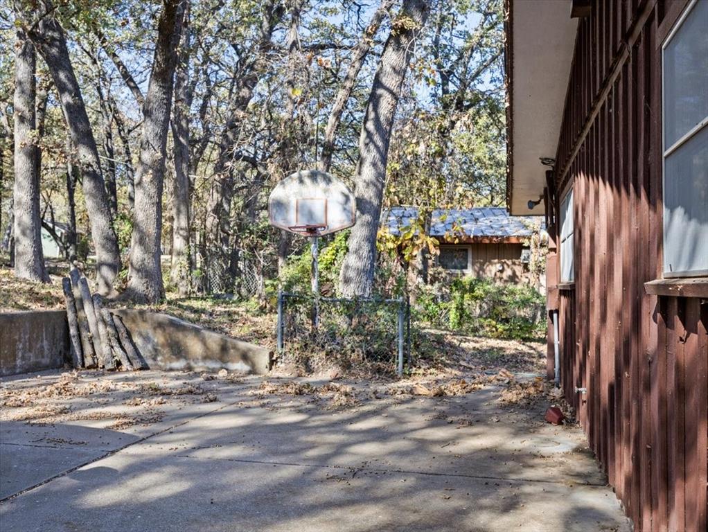 13030 Miller Road Azle, TX 76020 - Photo 30 of 40 a view of street along with trees
