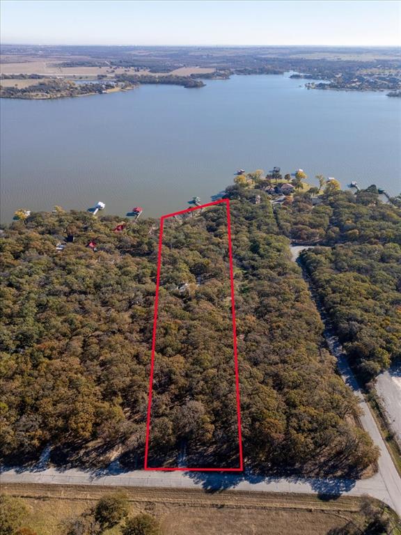 13030 Miller Road Azle, TX 76020 - Photo 3 of 40 a view of a terrace with a lake view