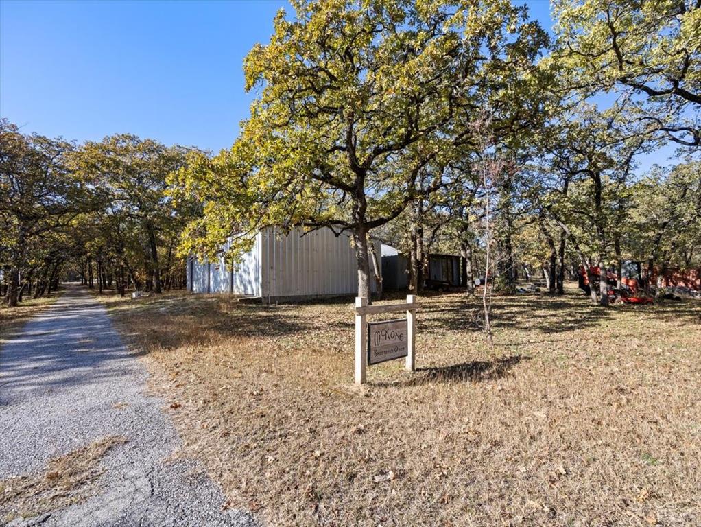 13030 Miller Road Azle, TX 76020 - Photo 31 of 40 a view of a yard with wooden fence