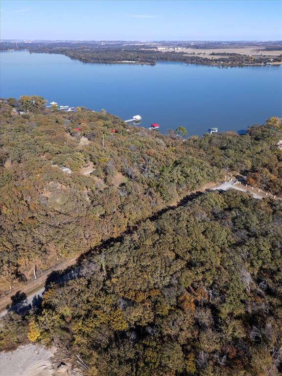 13030 Miller Road Azle, TX 76020 - Photo 33 of 40 a view of a large body of water with a building in the background