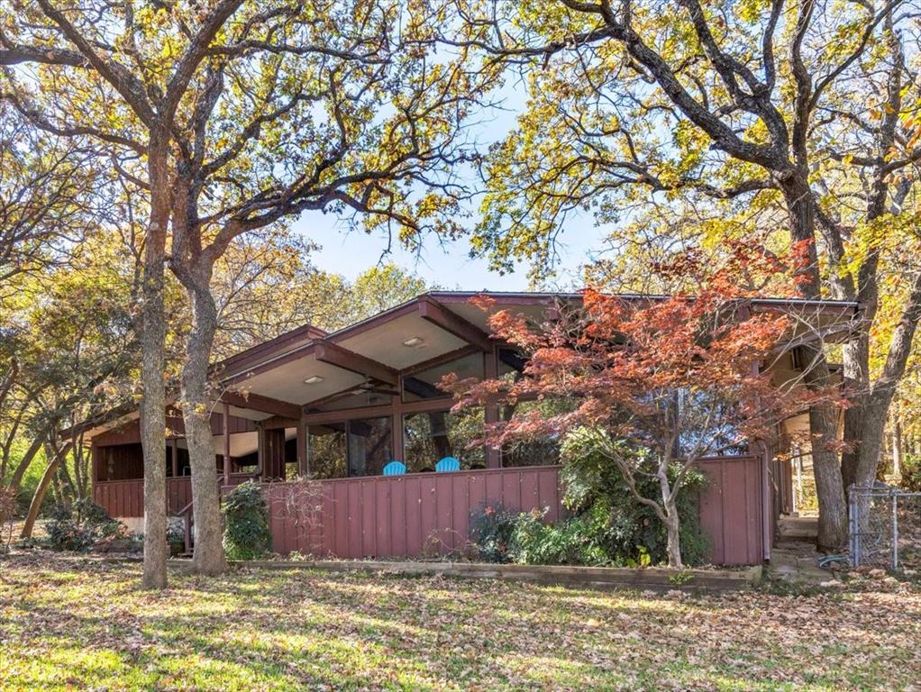 13030 Miller Road Azle, TX 76020 - Photo 6 of 40 a view of a house with a yard