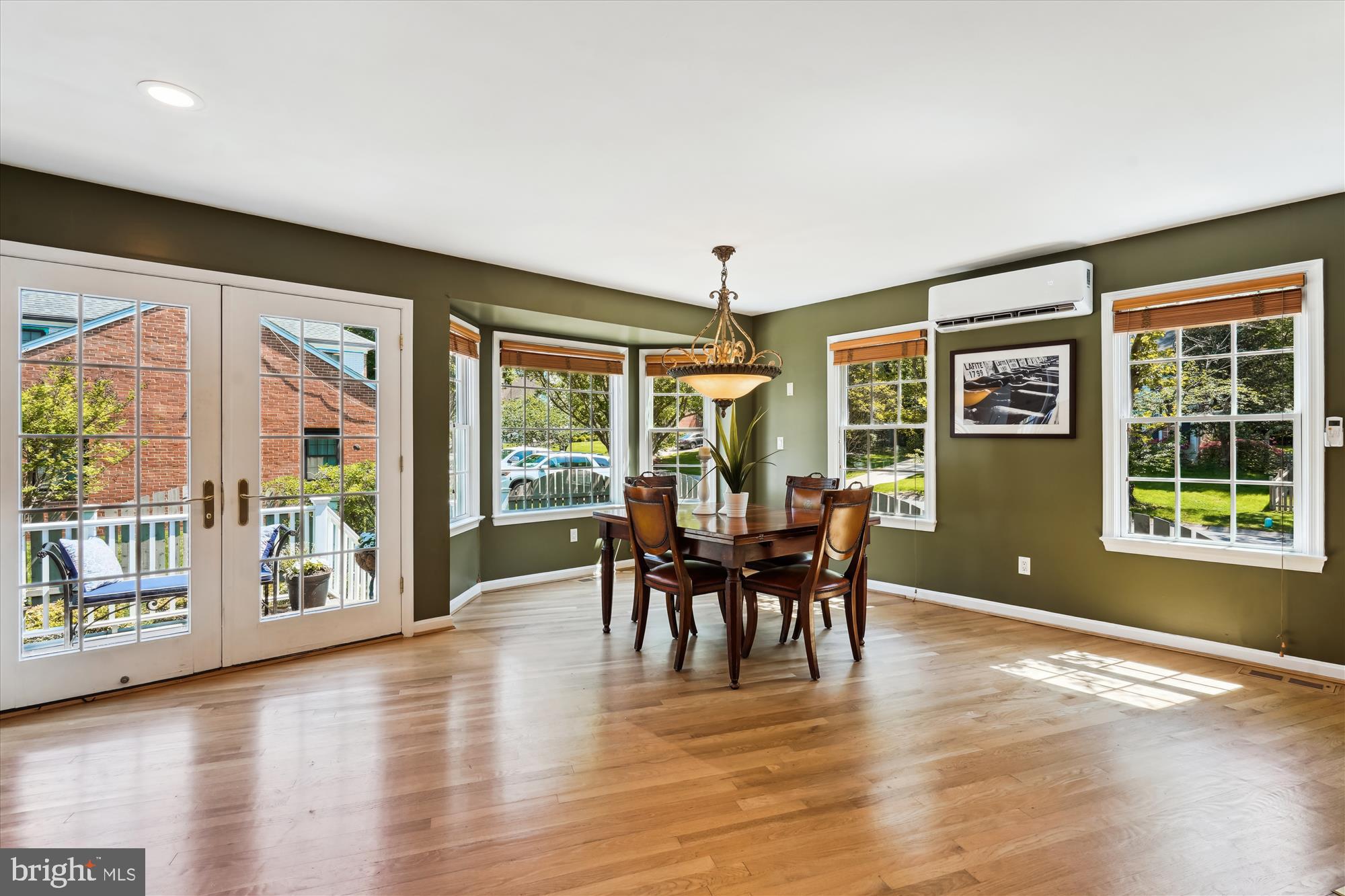 7101 Old Gate Road Rockville, MD 20852 - Photo 14 of 52 a view of a dining room with furniture window and wooden floor