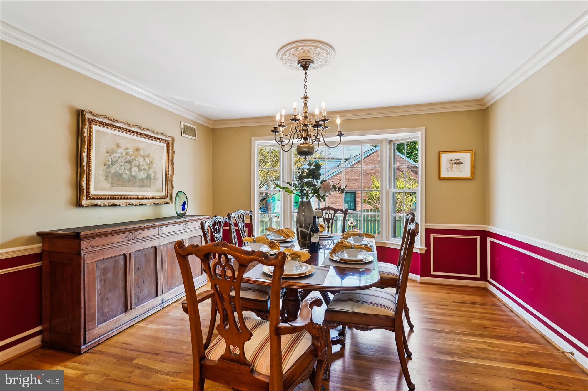 7101 Old Gate Road Rockville, MD 20852 - Photo 16 of 52 a view of a dining room with furniture window and wooden floor