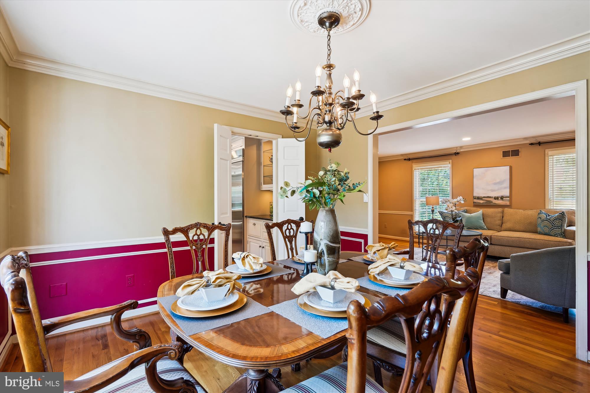 7101 Old Gate Road Rockville, MD 20852 - Photo 17 of 52 a view of a dining room with furniture window and wooden floor