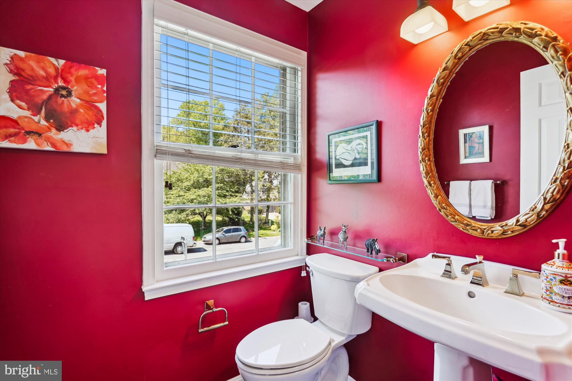 7101 Old Gate Road Rockville, MD 20852 - Photo 21 of 52 a bathroom with a bath tub sink mirror vanity and toilet