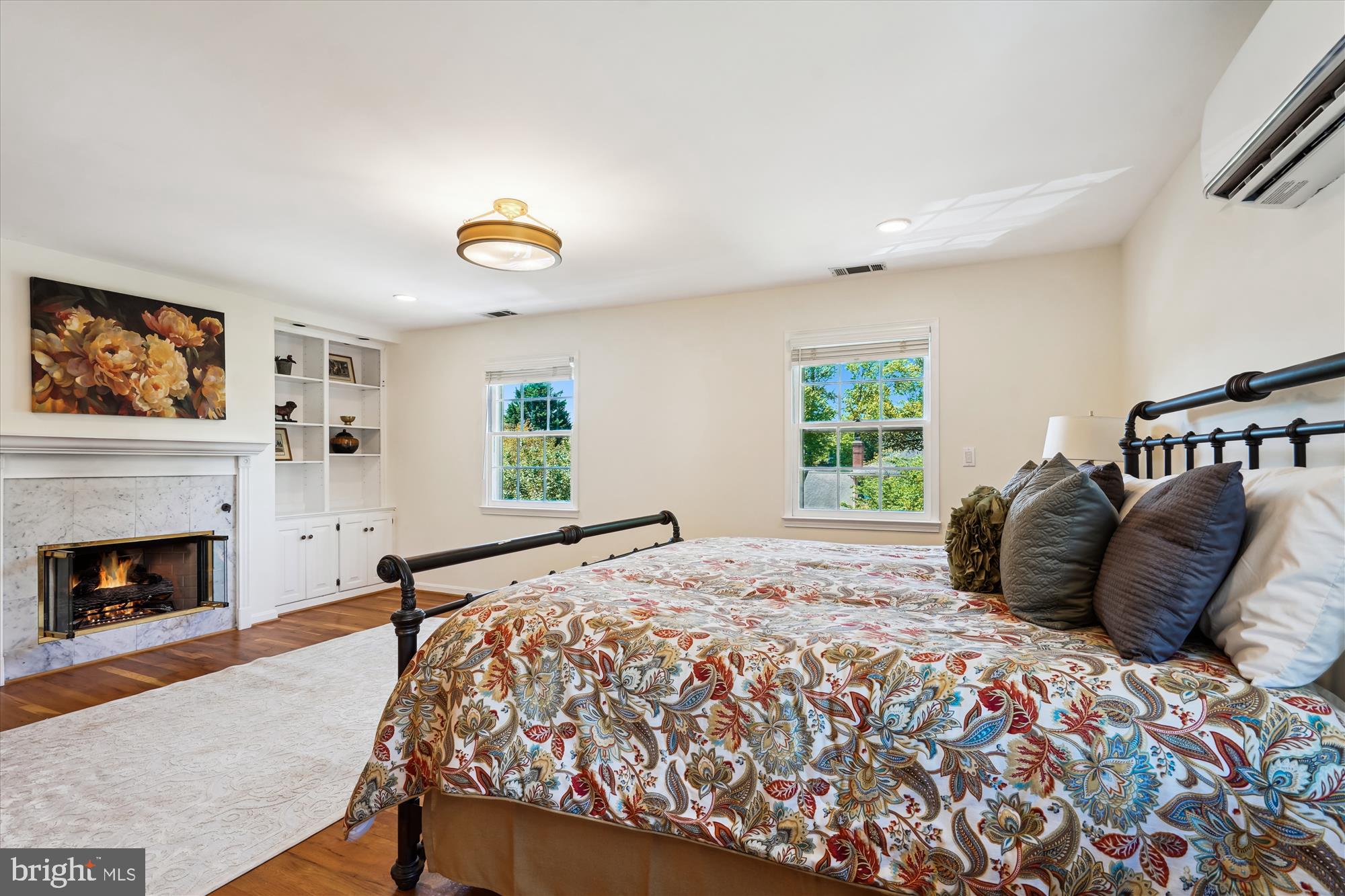 7101 Old Gate Road Rockville, MD 20852 - Photo 23 of 52 a bedroom with a bed and a fireplace