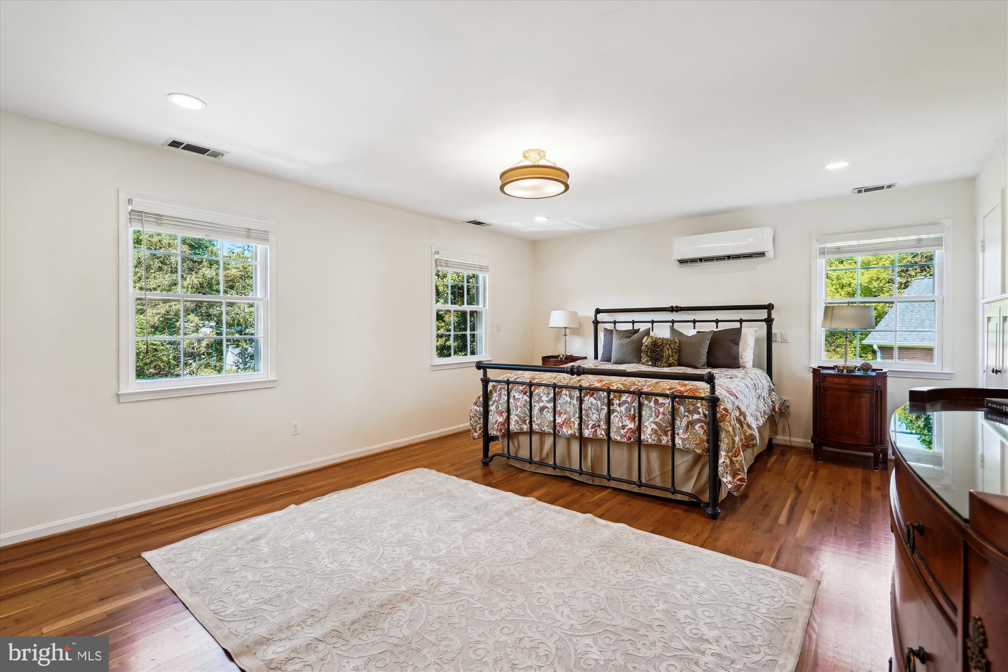 7101 Old Gate Road Rockville, MD 20852 - Photo 25 of 52 a bedroom with a bed and wooden floor