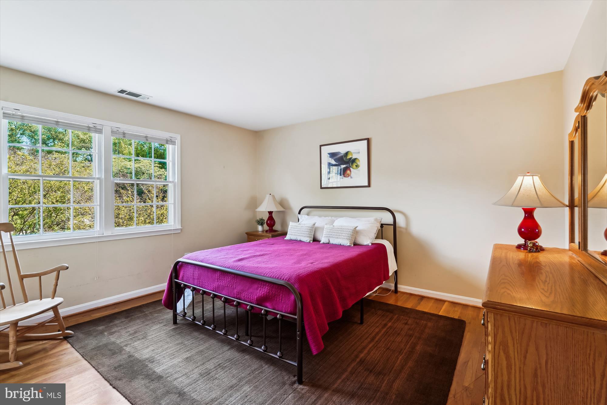 7101 Old Gate Road Rockville, MD 20852 - Photo 29 of 52 a bedroom with a bed and wooden floor