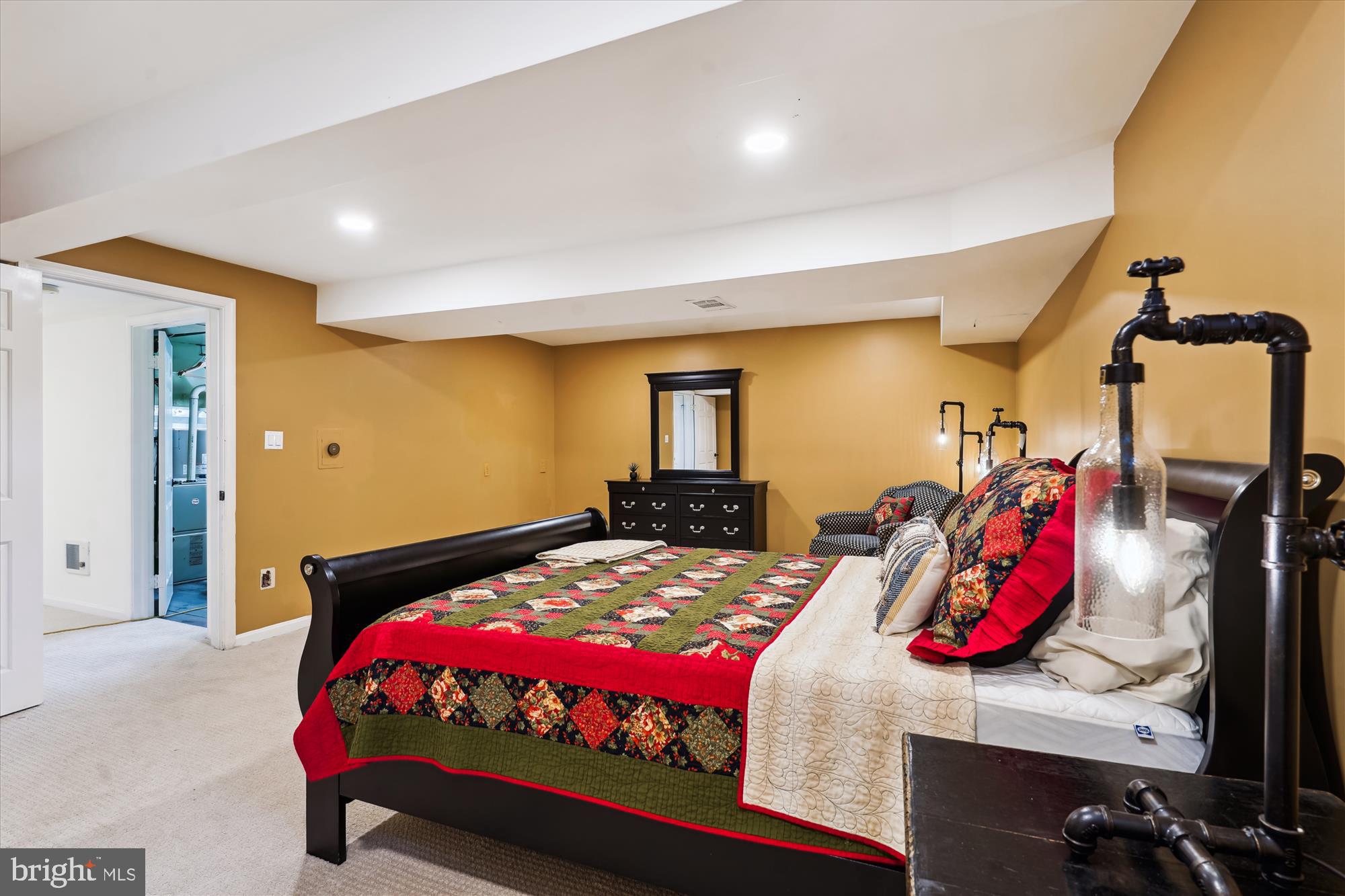 7101 Old Gate Road Rockville, MD 20852 - Photo 40 of 52 a bedroom with a bed and dresser