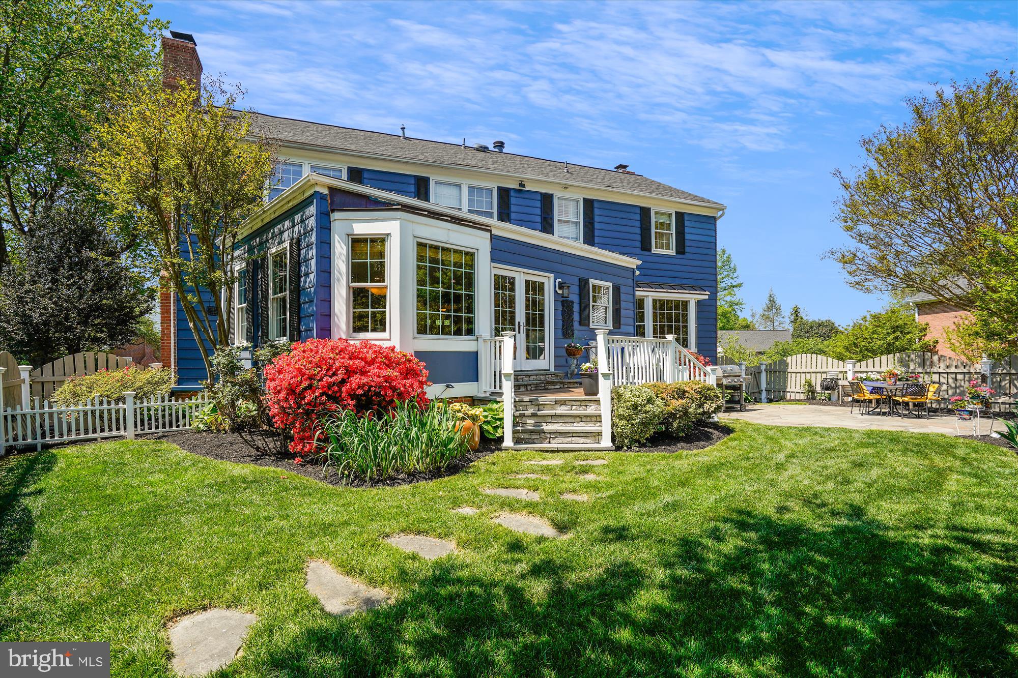 7101 Old Gate Road Rockville, MD 20852 - Photo 42 of 52 a view of a house with backyard and sitting area