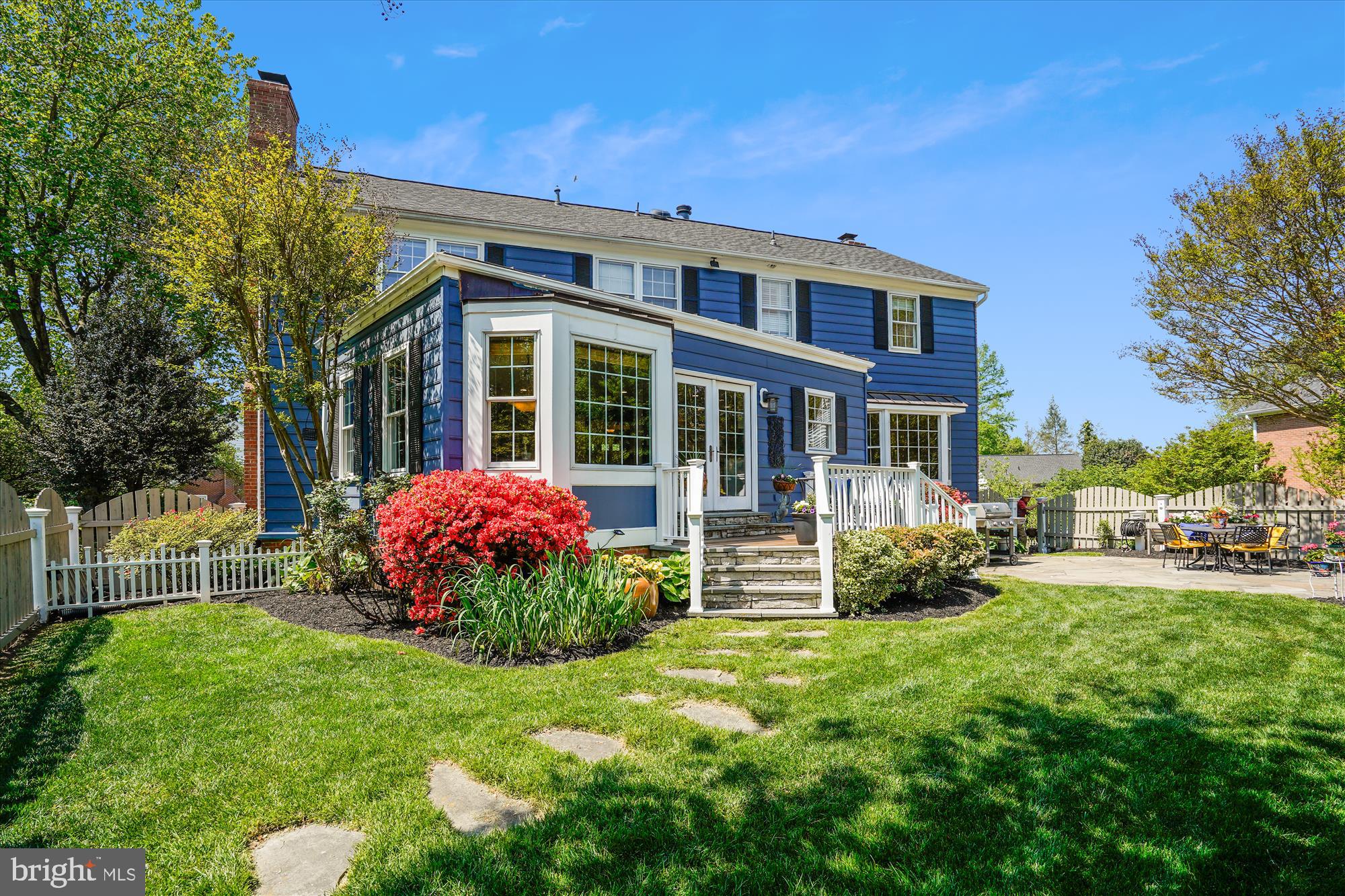 7101 Old Gate Road Rockville, MD 20852 - Photo 48 of 52 a front view of a house with garden