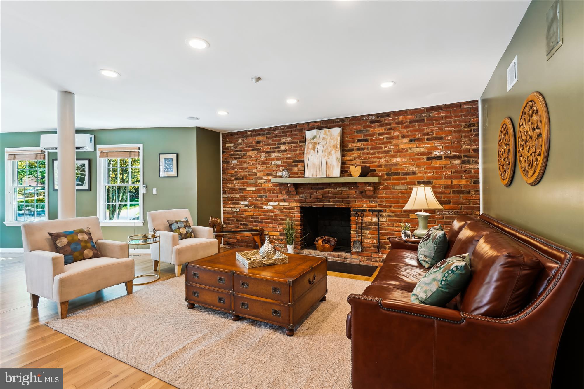 7101 Old Gate Road Rockville, MD 20852 - Photo 7 of 52 a living room with furniture and a fireplace