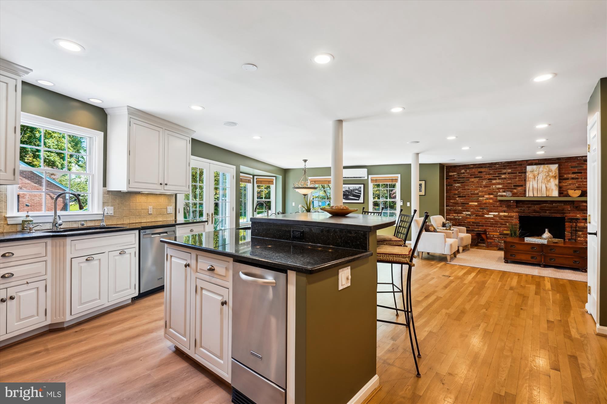 7101 Old Gate Road Rockville, MD 20852 - Photo 9 of 52 a kitchen with stainless steel appliances granite countertop a sink and cabinets