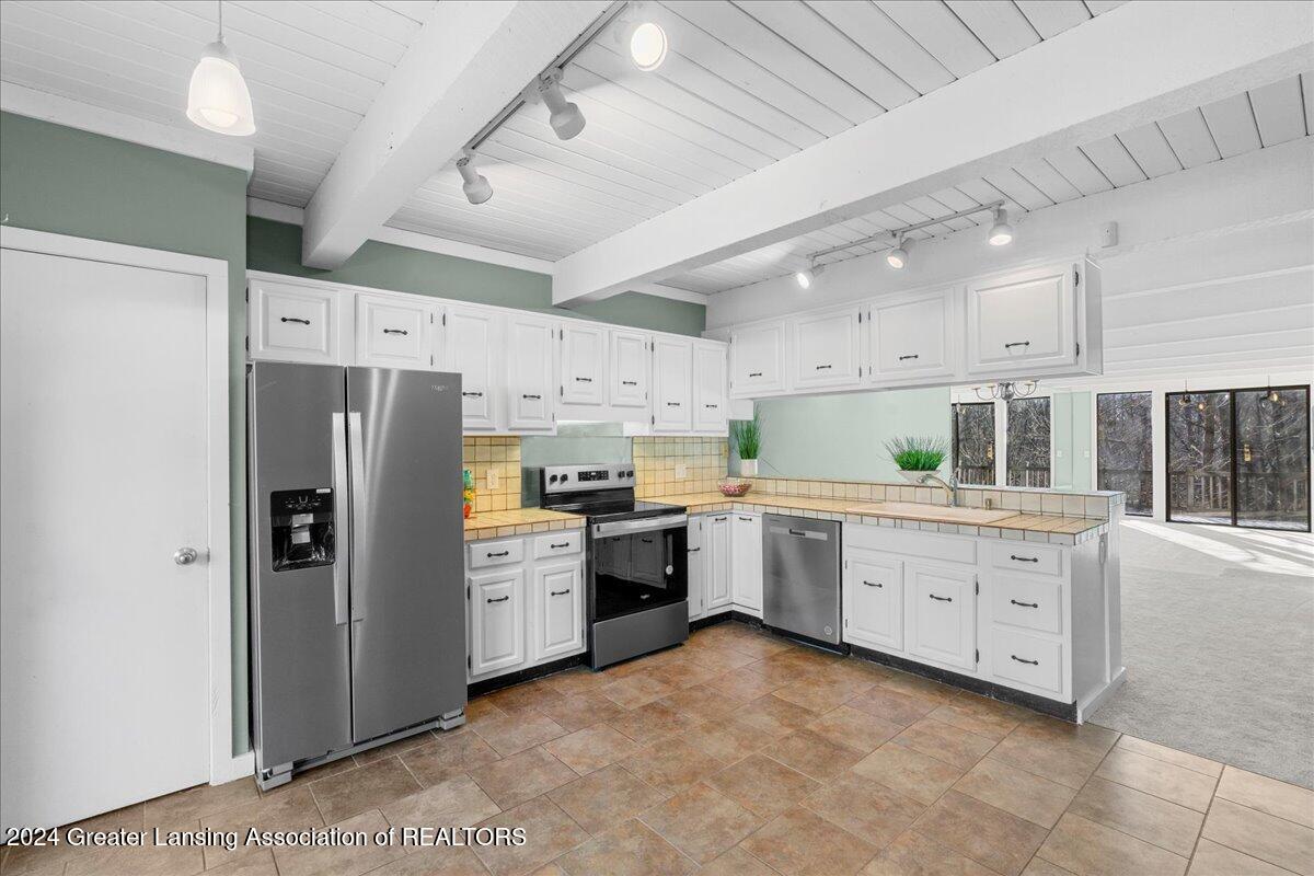 2057 Hamilton Road, Unit 9 Okemos, MI 48864 - Photo 16 of 37 17-Media Jett - 14