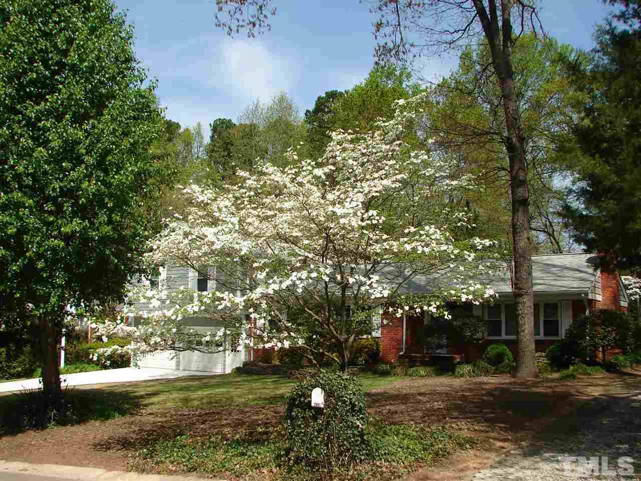 409 Vernon Terrace Raleigh, NC 27609 - Photo 21 of 23 What A Beautiful Entrance with Blooming Dogwood and Loads of Perennials...