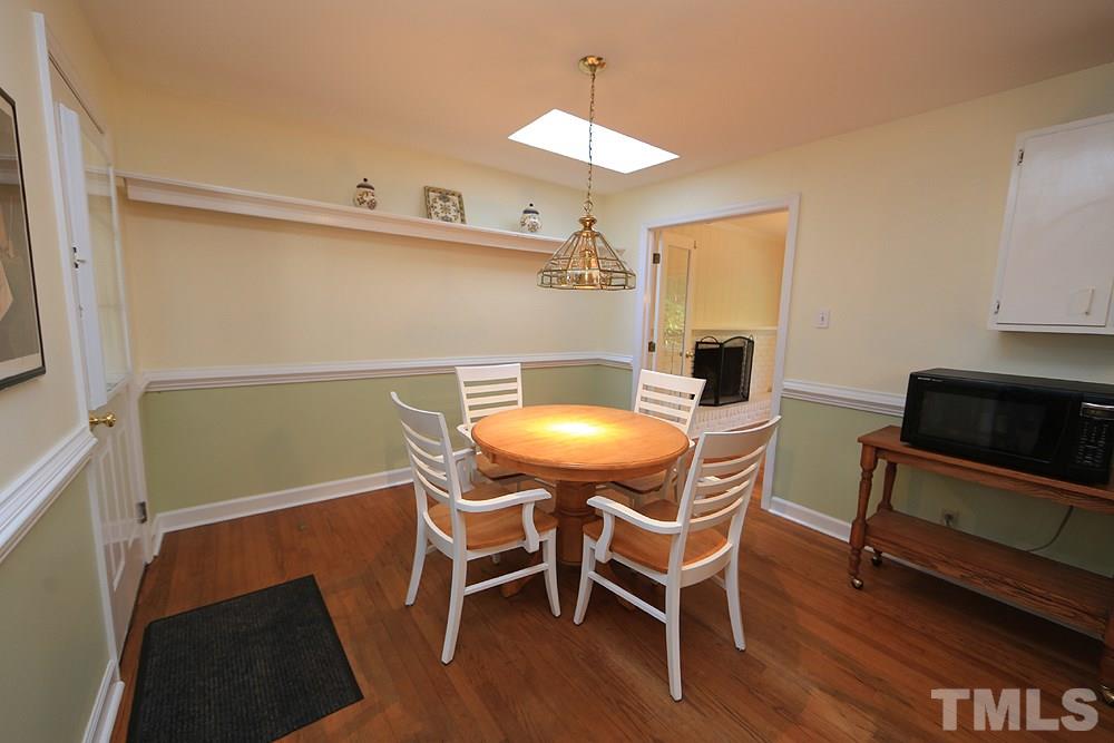 409 Vernon Terrace Raleigh, NC 27609 - Photo 8 of 23 Eat In Kitchen/Breakfast Room. Large Enough to Accommodate a Farm Table. Offers a Skylight and Open to the Kitchen and Family Room !