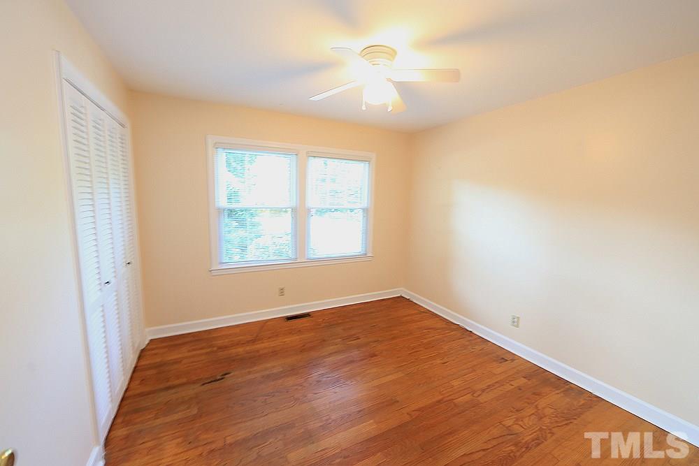 409 Vernon Terrace Raleigh, NC 27609 - Photo 9 of 23 Main Floor Bedroom with Dual Windows and Ceiling Fan