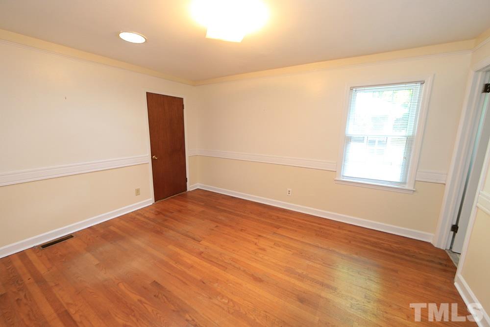 409 Vernon Terrace Raleigh, NC 27609 - Photo 10 of 23 Main Floor Bedroom with Dedicated Bath. Great for Master Bedroom or Room for Guests. Natural light also from a Solar Tube !