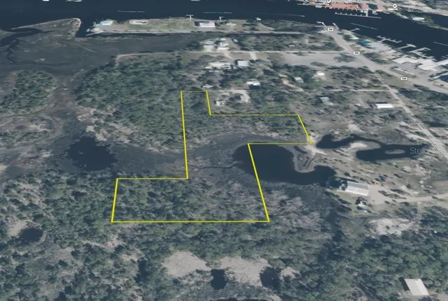 a view of a backyard of a house