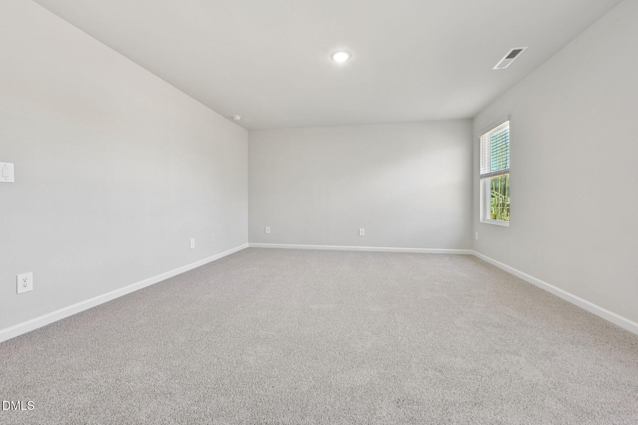 2145 Topsail Road Durham, NC 27703 - Photo 43 of 49 an empty room with a window