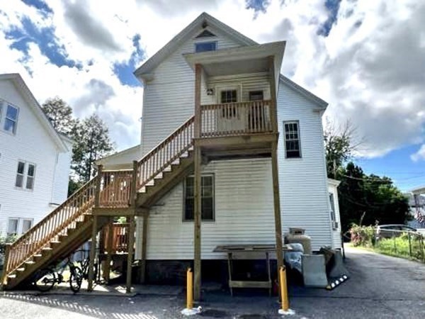 9 Castle Street Ware, MA 01082 - Photo 5 of 19 a view of a house with a car parked on the road
