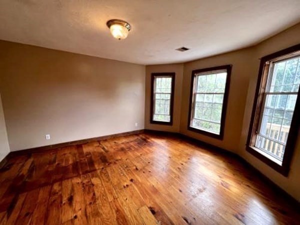 9 Castle Street Ware, MA 01082 - Photo 10 of 19 a view of an empty room with glass door