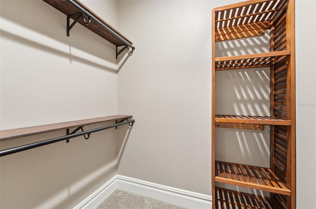 855 Southeast 87th Street Ocala, FL 34480 - Photo 44 of 79 a view of walk in closet with rug