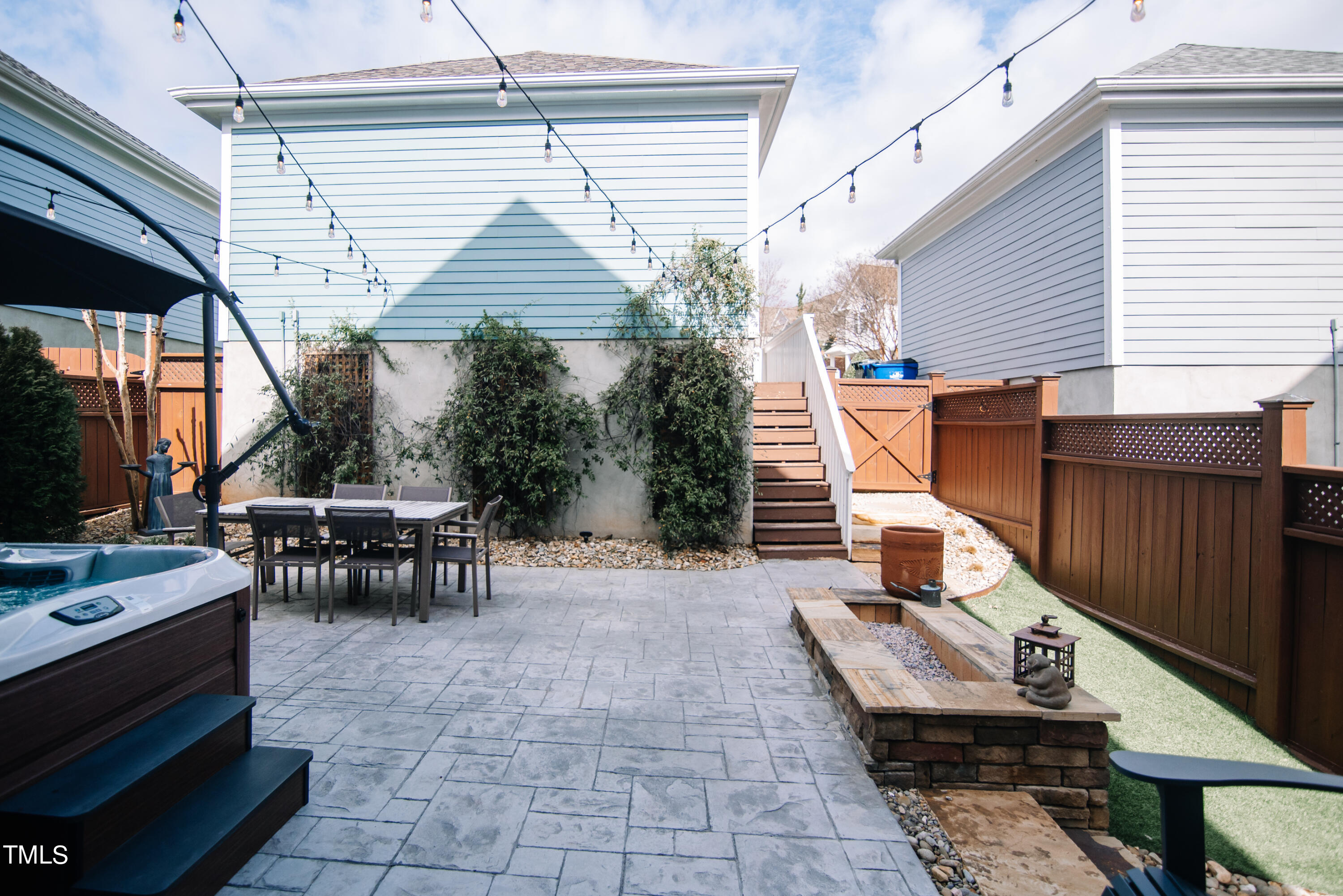 2222 Dunlin Lane Raleigh, NC 27614 - Photo 26 of 35 Fence provides privacy while you dine al fresco or melt your stress away in the hot tub.