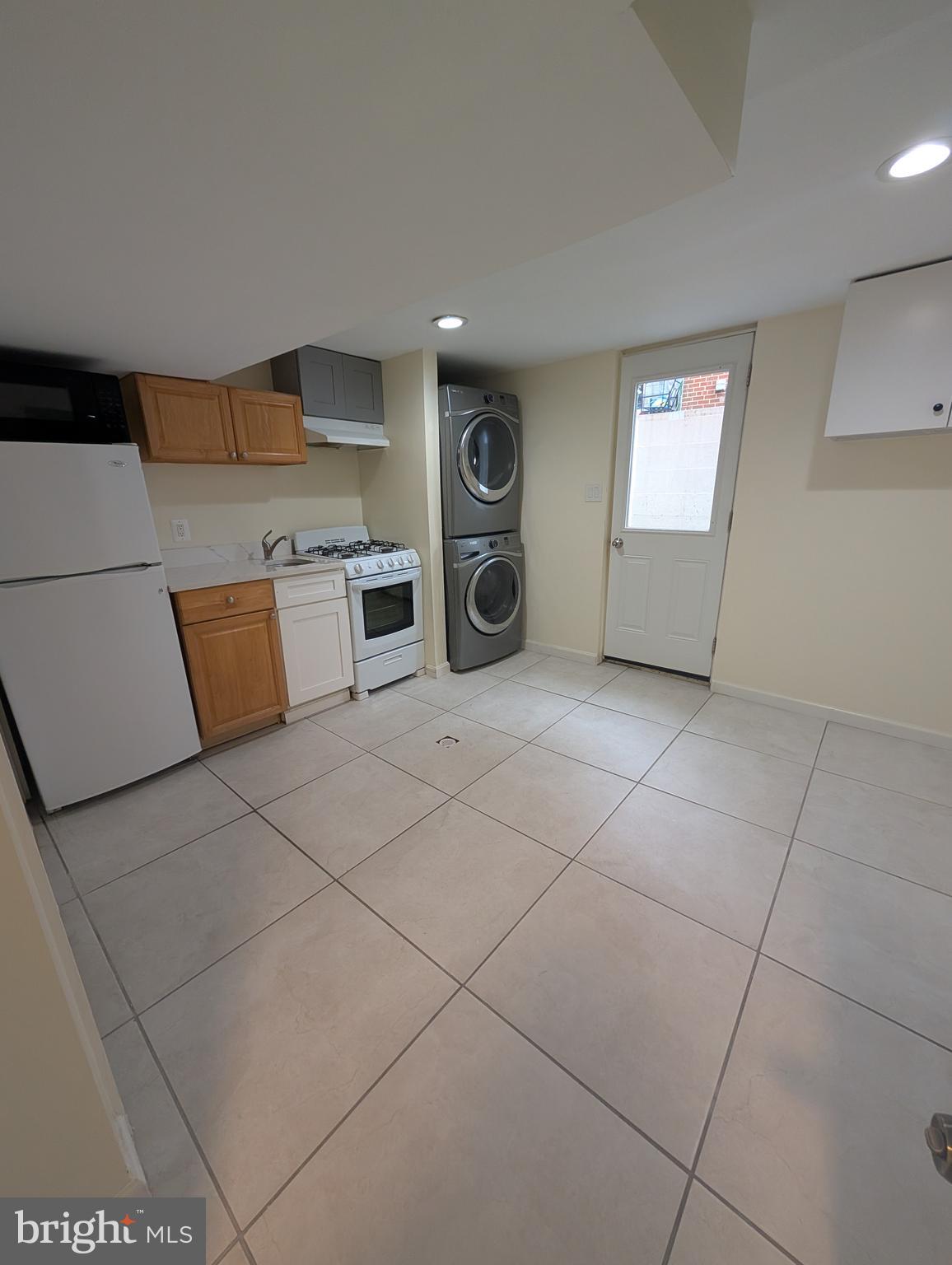11926 Bluhill Road Silver Spring, MD 20902 - Photo 14 of 27 a view of kitchen and microwave