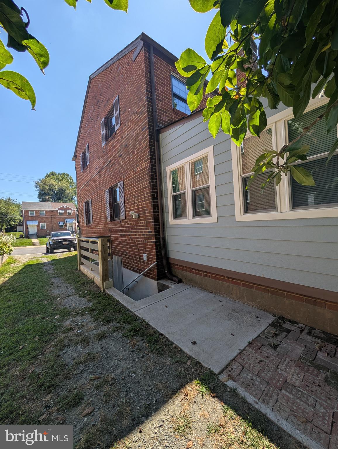11926 Bluhill Road Silver Spring, MD 20902 - Photo 26 of 27 a backyard of a house with lots of green space