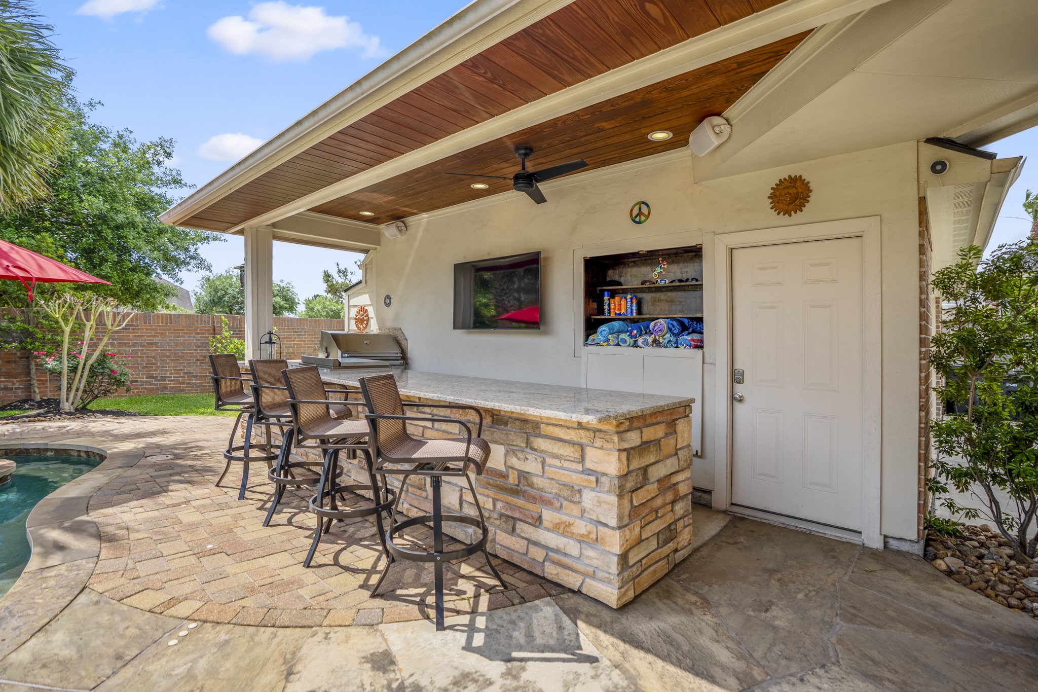 9707 Blue Cruls Way Spring, TX 77379 - Photo 43 of 50 a view of an chairs and tables in the patio