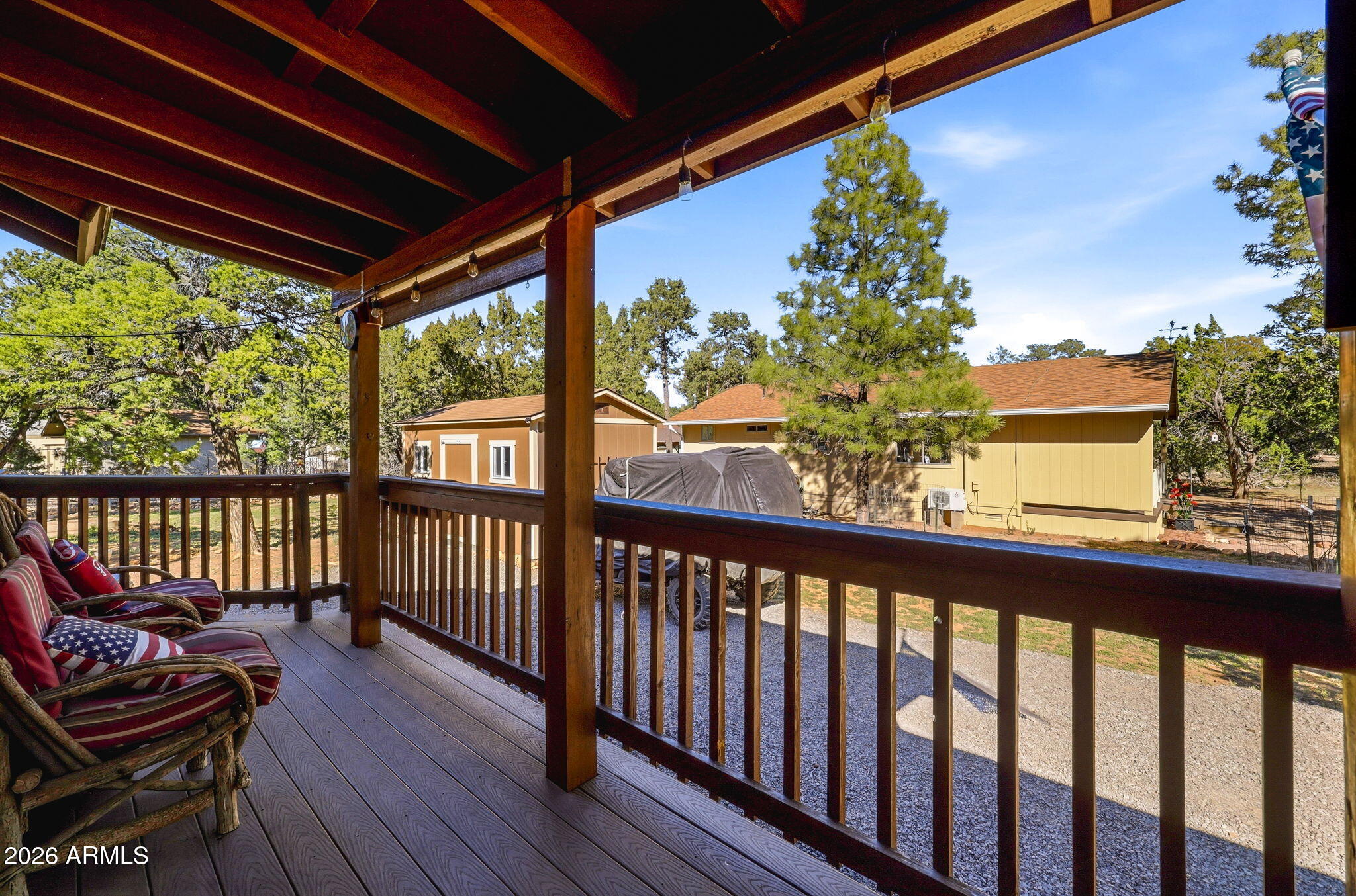 2112 Fishermans Road Overgaard, AZ 85933 - Photo 11 of 18 a view of a two chairs in the balcony