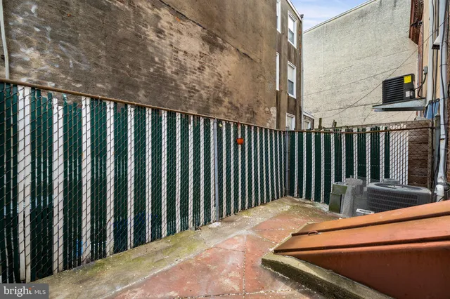 a balcony with a yard