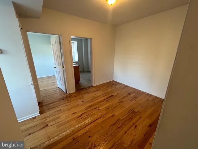 a kitchen with stainless steel appliances a stove a sink and a refrigerator