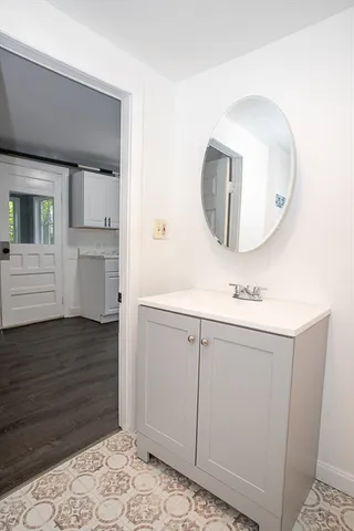a bathroom with a tub and a shower