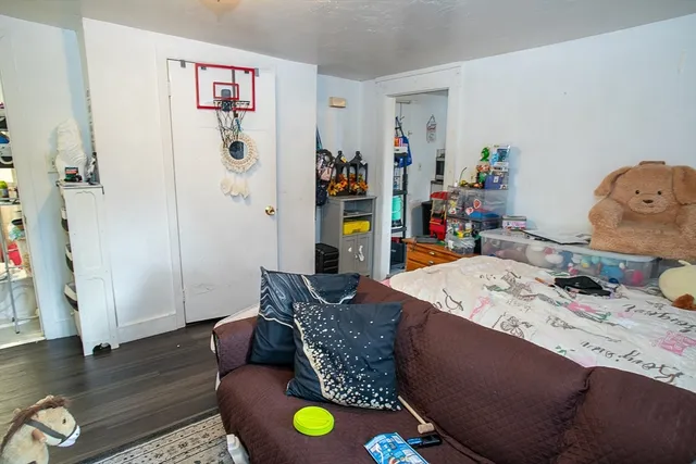a kitchen with a stove a sink and a microwave