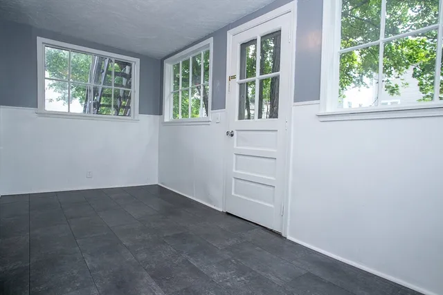 an empty room with a window