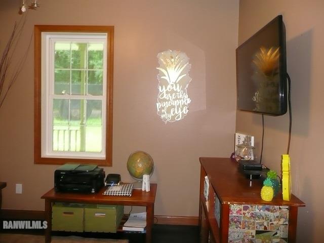 6570 West Cook Road Lena, IL 61048 - Photo 20 of 58 a living room with furniture and a flat screen tv
