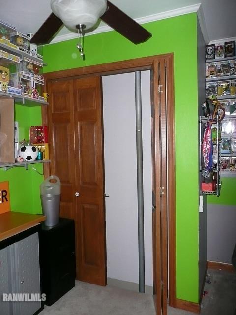 6570 West Cook Road Lena, IL 61048 - Photo 32 of 58 a room that has a bed and a table in it
