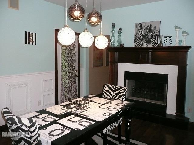 6570 West Cook Road Lena, IL 61048 - Photo 7 of 58 a view of a dining room with furniture and chandelier