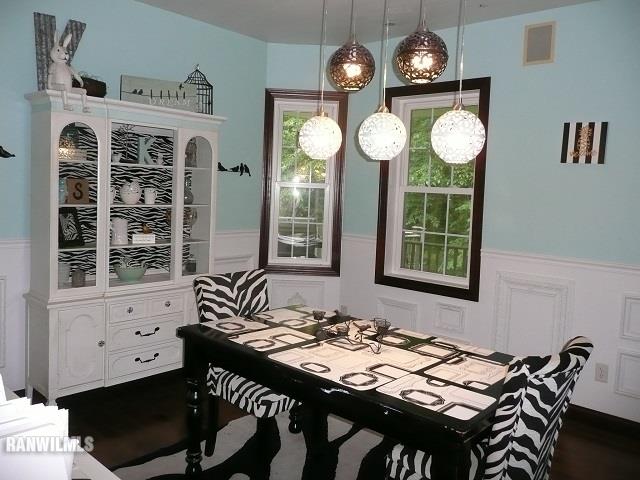 6570 West Cook Road Lena, IL 61048 - Photo 8 of 58 a view of a dining area with furniture and a large window