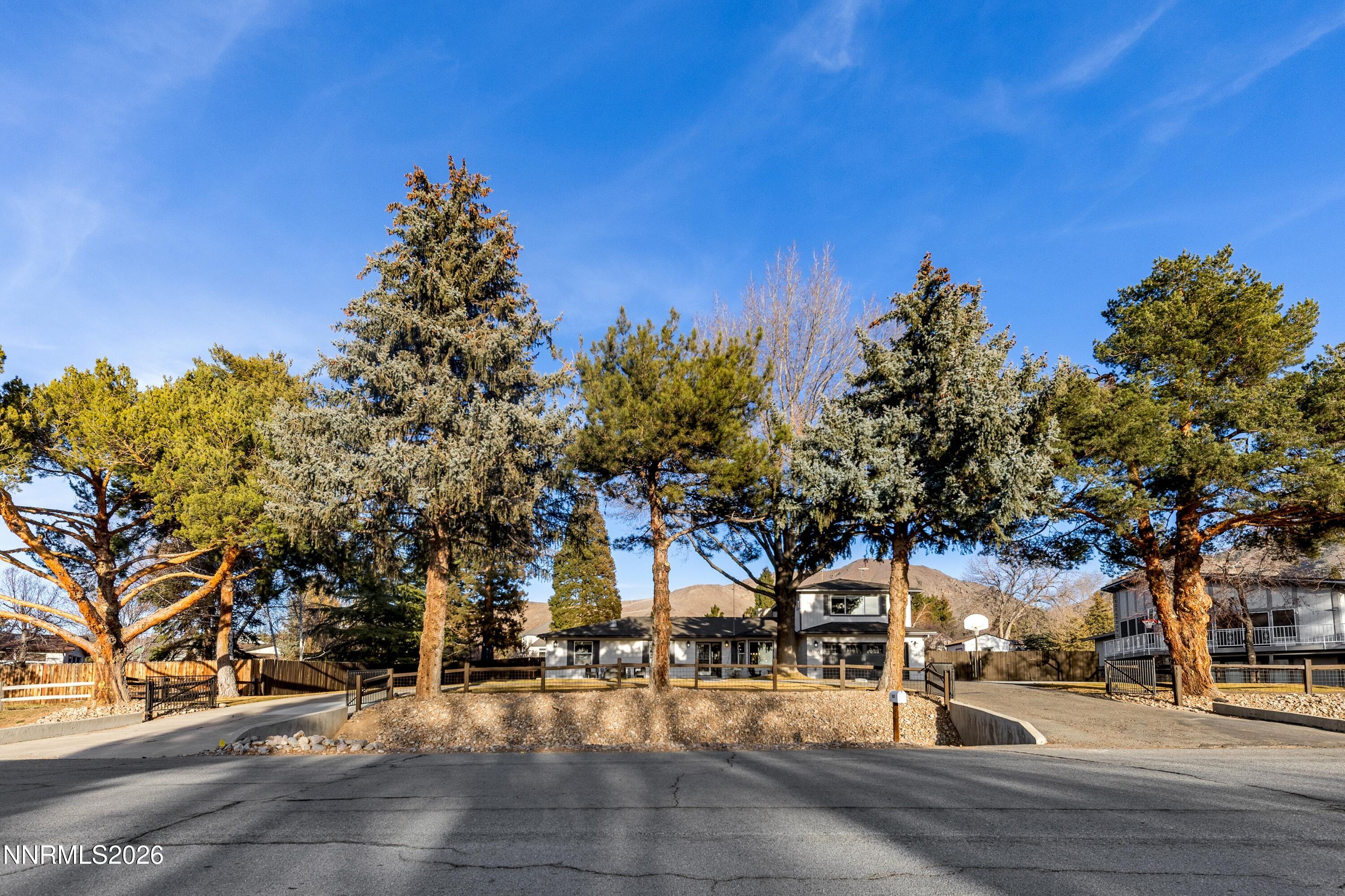 3620 East Hidden Valley Drive Reno, NV 89502 - Photo 1 of 67 a view of a park with tree s