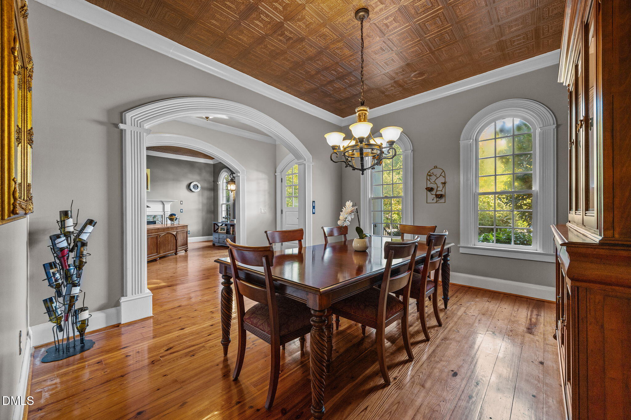 1329 Wynncrest Court Raleigh, NC 27603 - Photo 13 of 64 a view of a dining room with furniture window and wooden floor