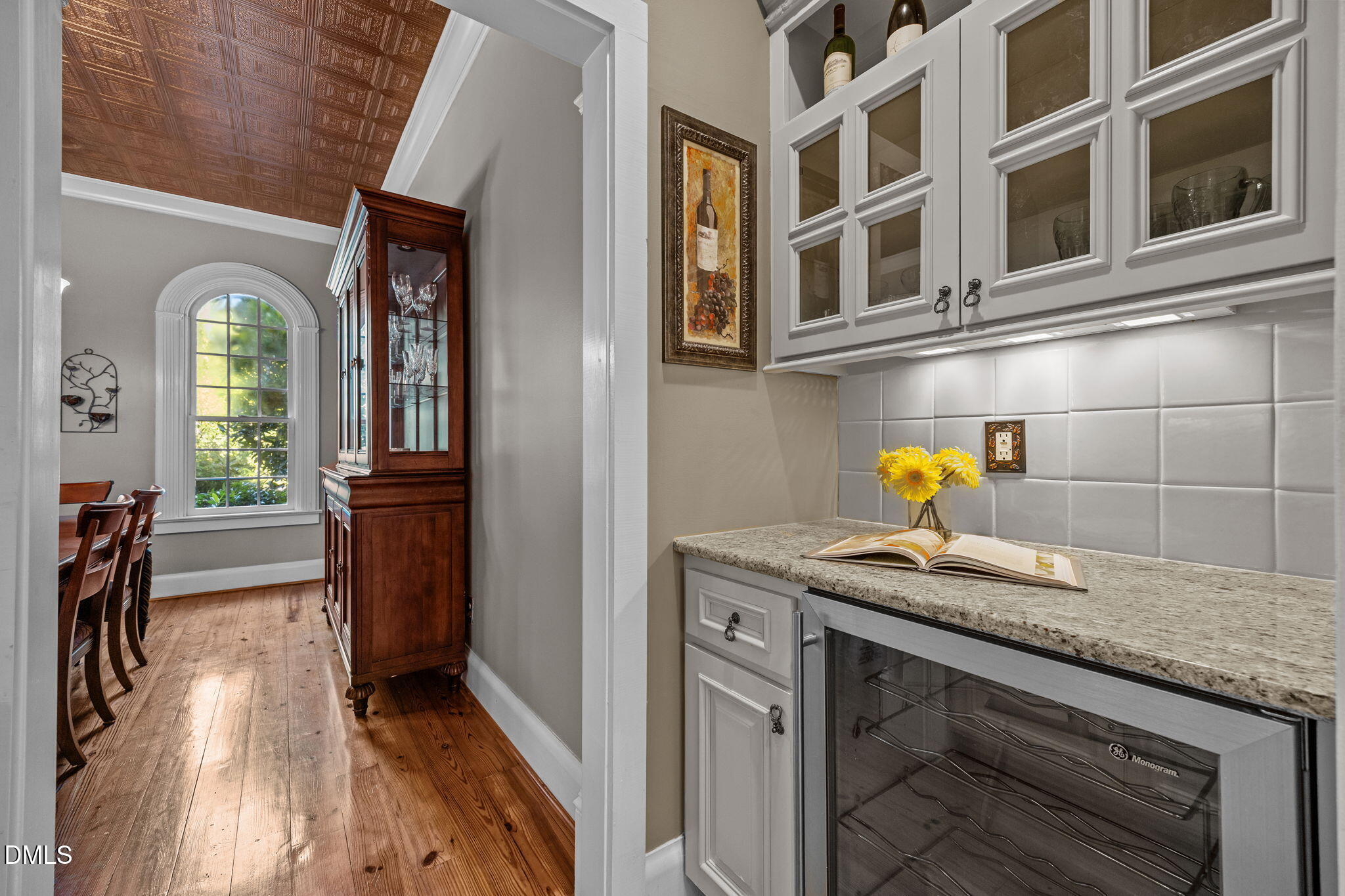 1329 Wynncrest Court Raleigh, NC 27603 - Photo 15 of 64 a kitchen with a granite countertop sink a stove and cabinets
