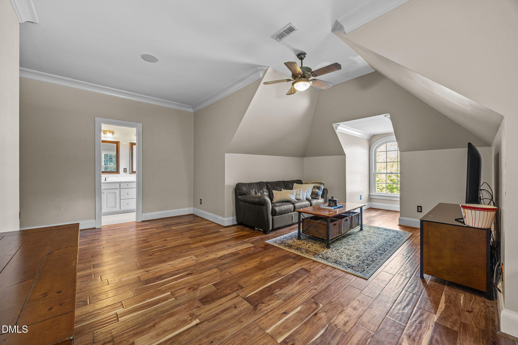 1329 Wynncrest Court Raleigh, NC 27603 - Photo 47 of 64 a living room with furniture and a fireplace